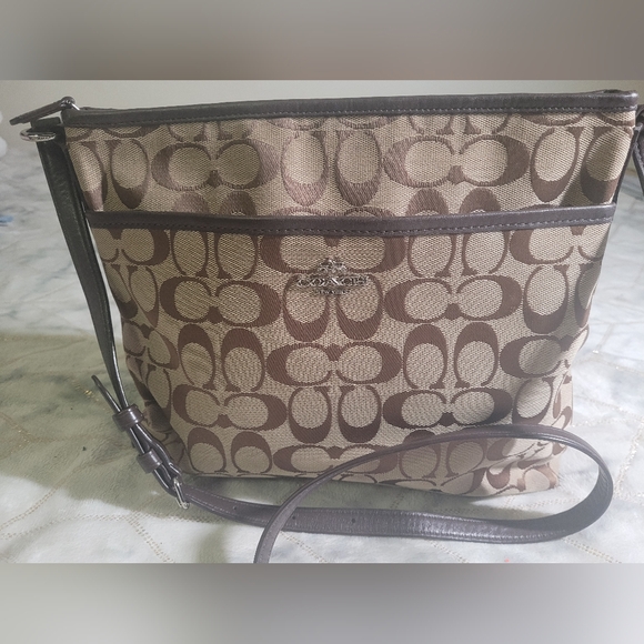 Coach Handbags - Coach’s cross body in medium size is a stylish and practical handbag